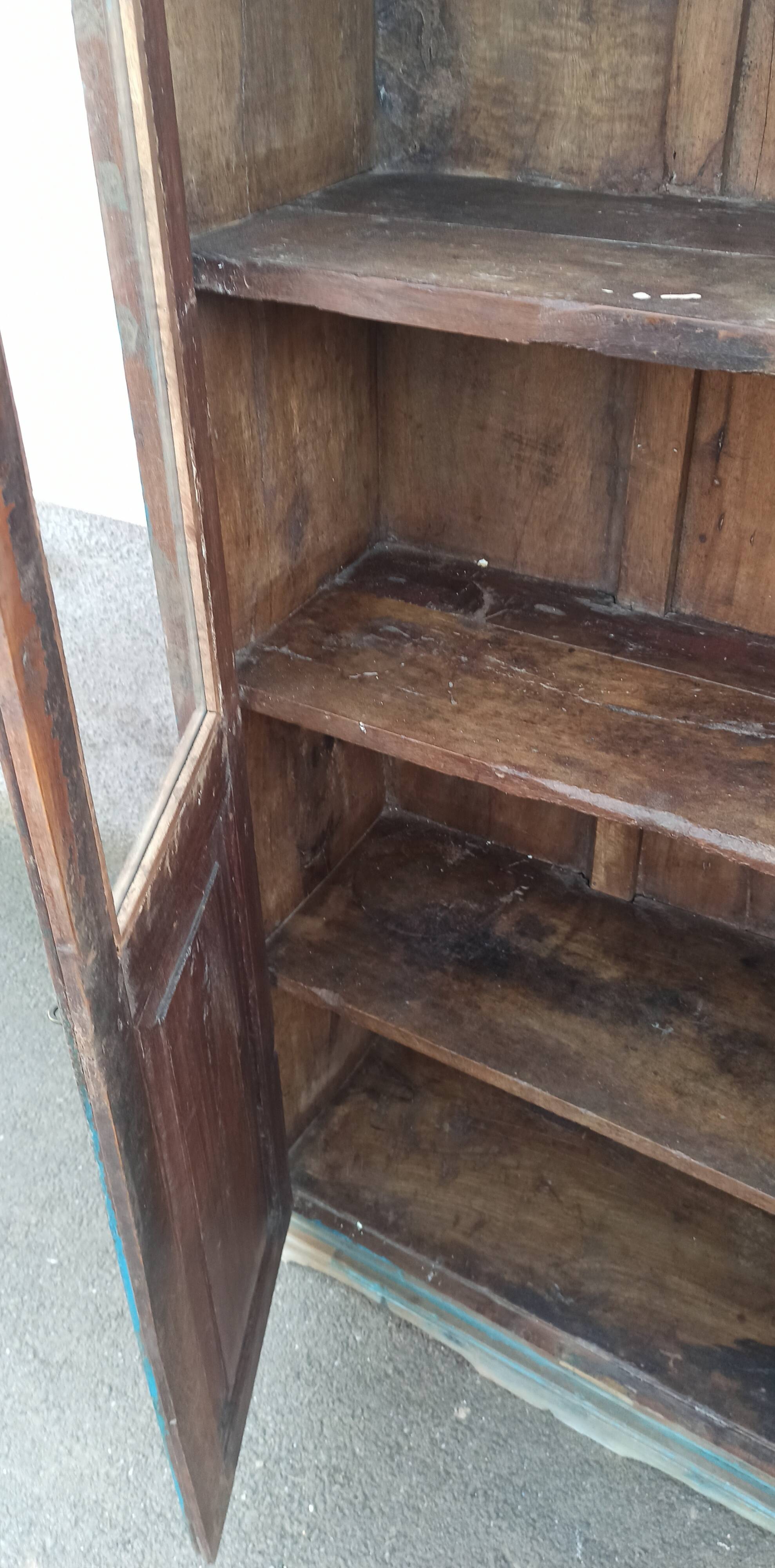 Old glazed wooden cabinet with beautiful patina