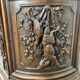 Buffet deux corps de chasse de style Henri II en chêne sculpté vitré