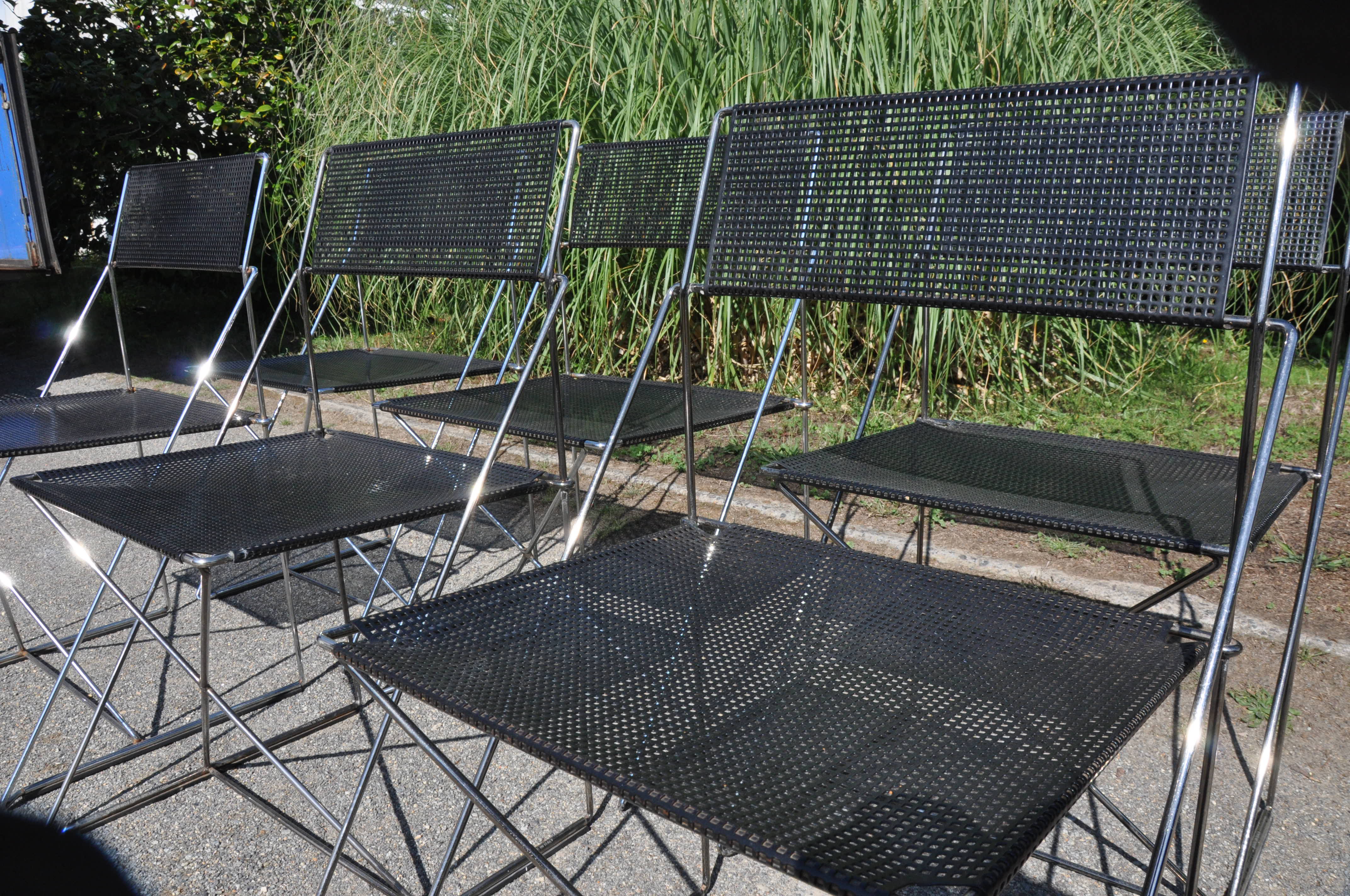 Nuova x line omli chairs by Niels Jørgen Haugesen