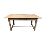 Old farm table in raw oak