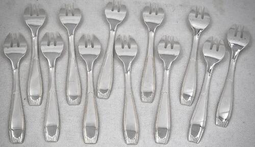 Alfénide, Christofle Paris, 12 oyster forks, Art Deco in silver-plated metal.