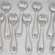 Alfénide, Christofle Paris, 12 oyster forks, Art Deco in silver-plated metal.