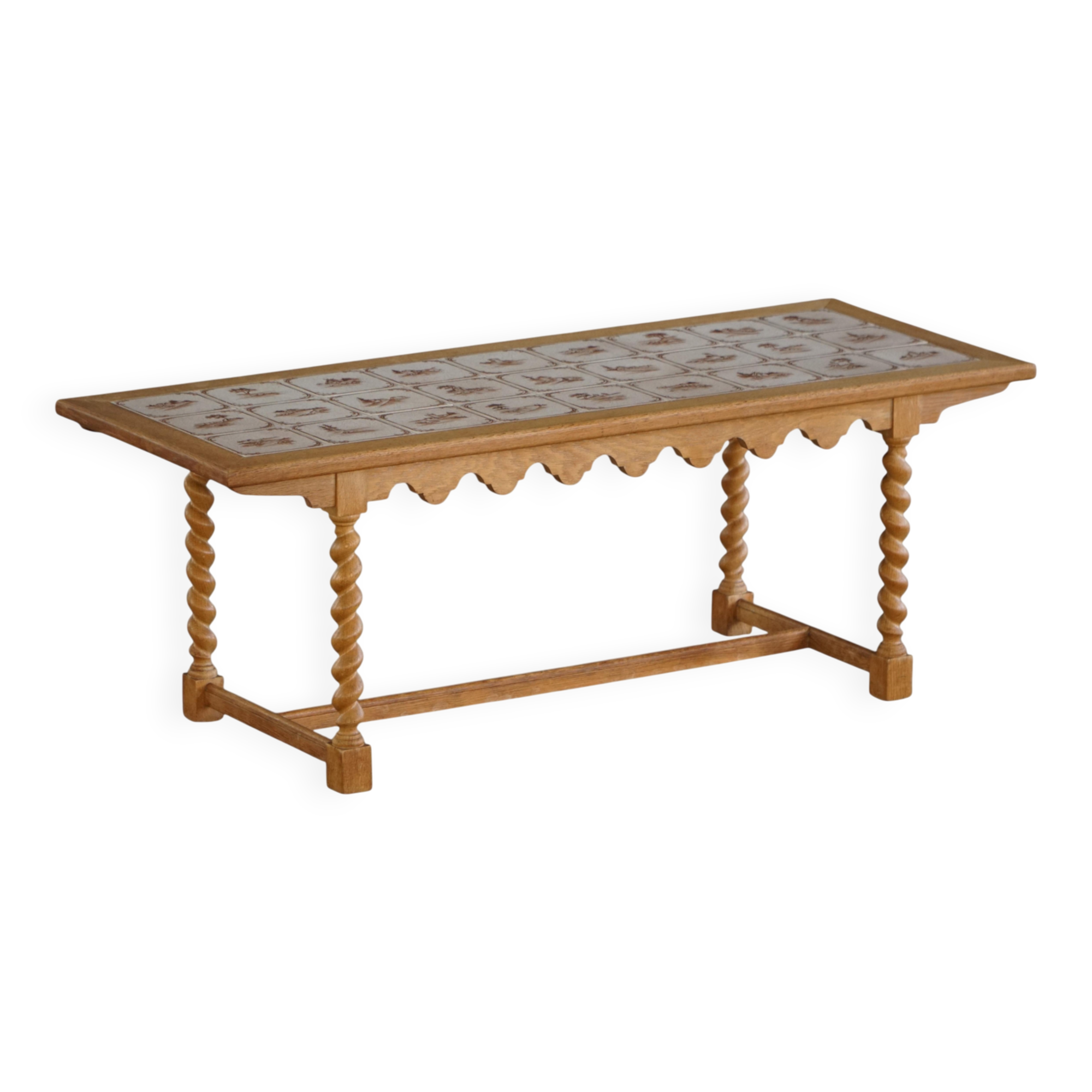 Mid-century modern Danish coffee table in oak with a ceramic top, 1950s.