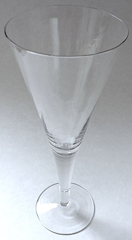 Suite of six colorless crystal champagne flutes