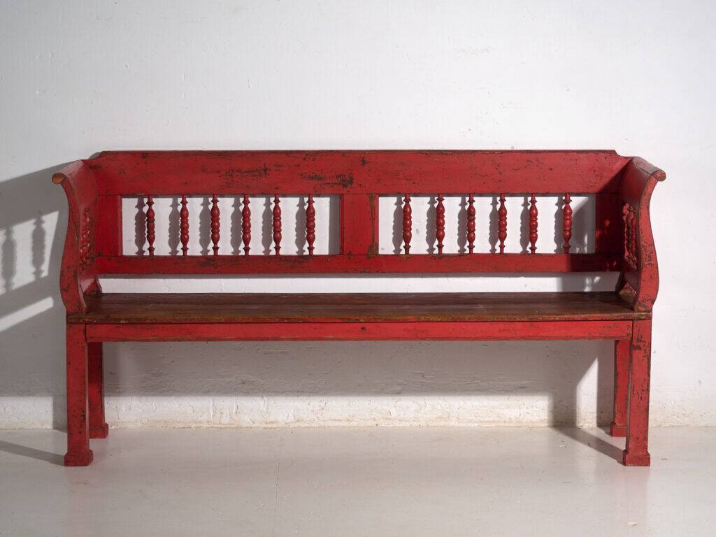 Old red-painted pine bench with turned backrest – Central Europe, circa 1900
