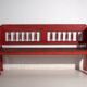 Old red-painted pine bench with turned backrest – Central Europe, circa 1900