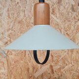Suspension in beige enameled sheet metal