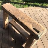 Trestle-shaped wooden bench