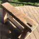 Trestle-shaped wooden bench