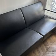 Sofa and armchair in Swedish black leather by Gunilla Allard for Lammhults.
