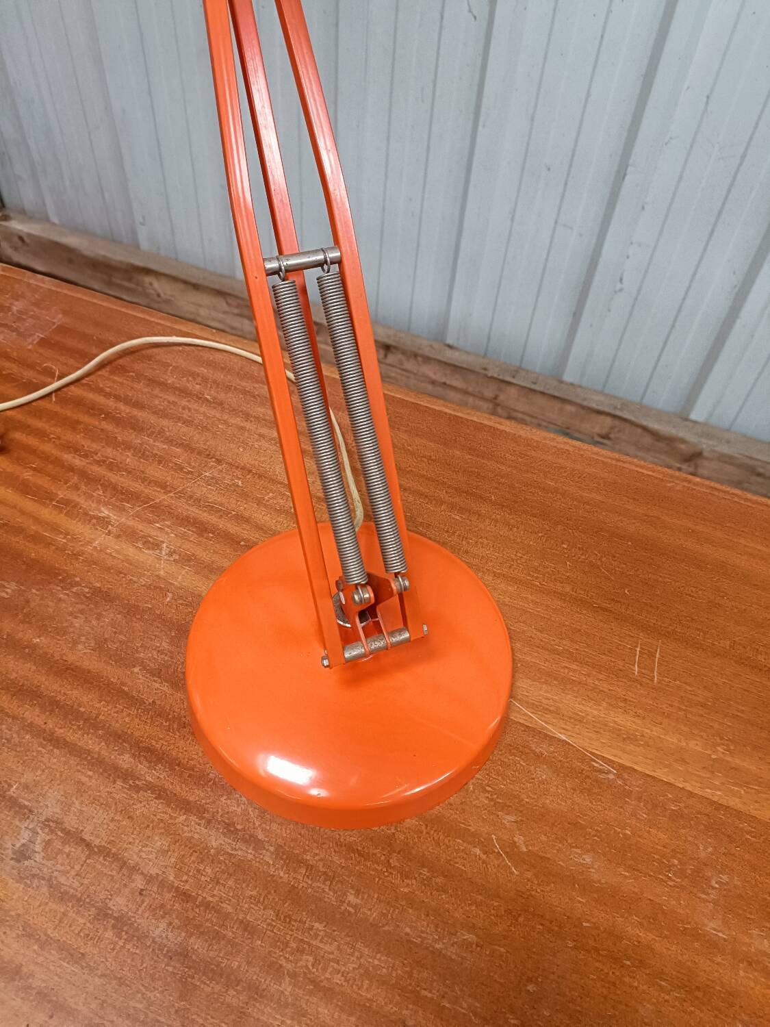 Luxo L4 vintage orange lamp with foot