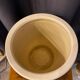 Cache pot en ceramique couleur gres clair forme ronde