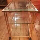 Trolley on wheels in gilded brass and beveled glass