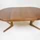 Expandable round teak table
