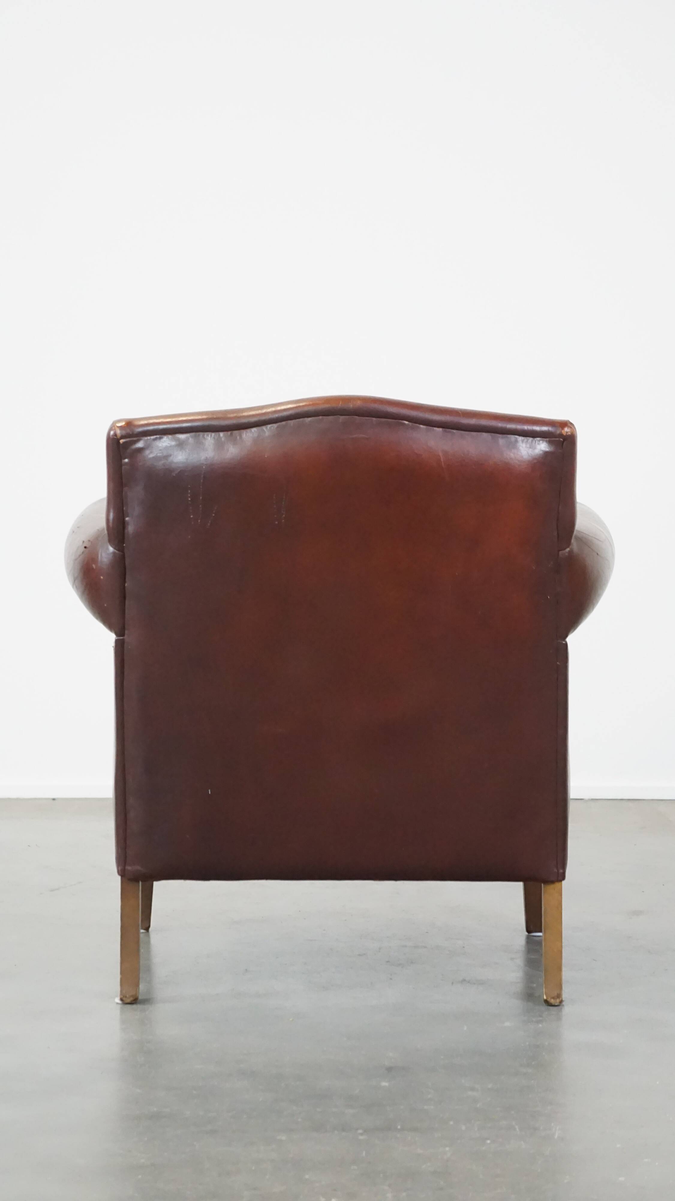 Design armchair made of sheep leather with a clean finish