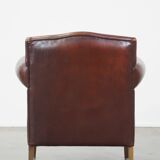 Design armchair made of sheep leather with a clean finish