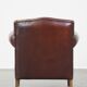 Design armchair made of sheep leather with a clean finish
