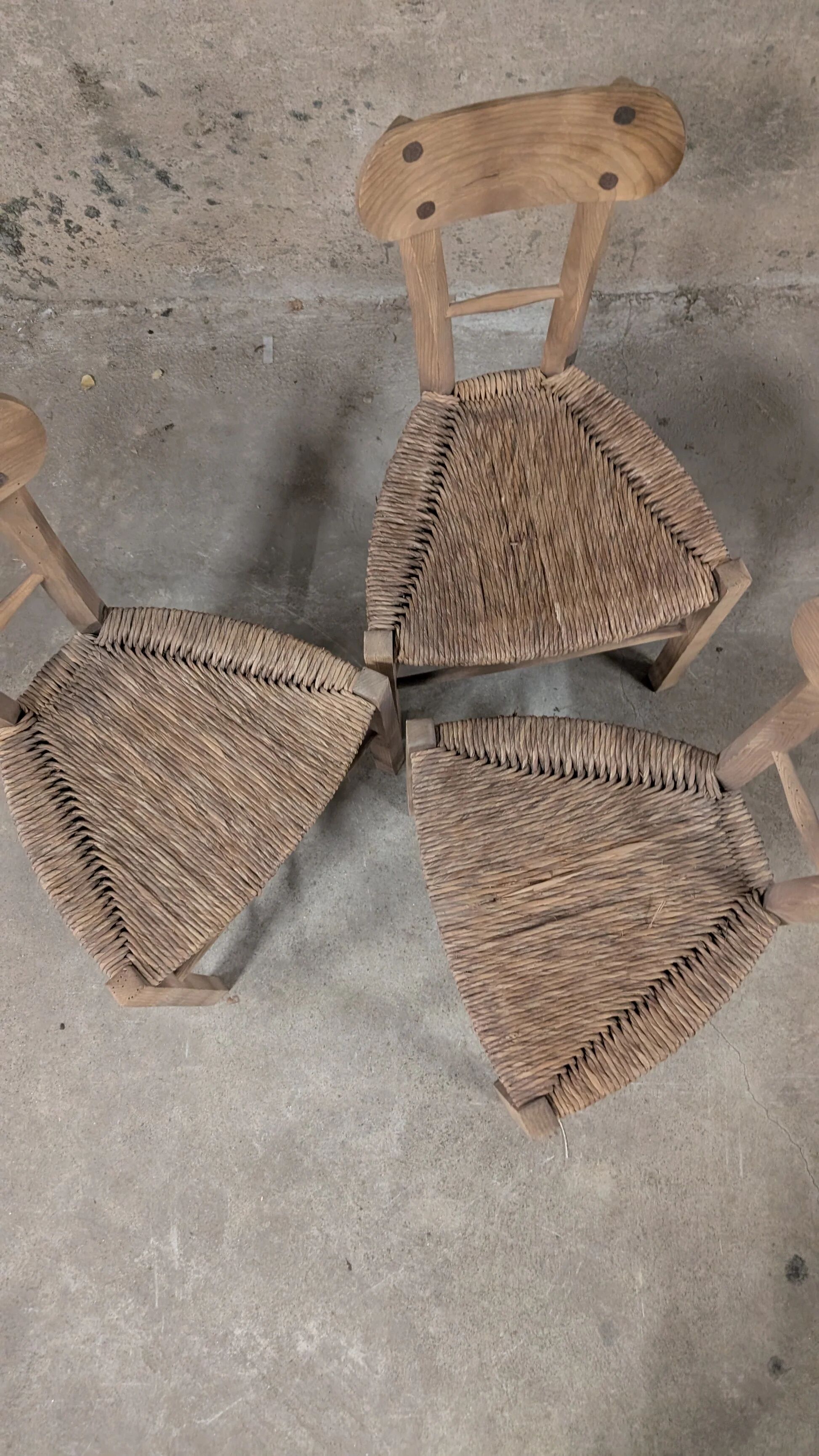 Set of 3 rustic wooden and woven straw chairs
