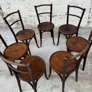 Set of 7 old Baumann bistro chairs in curved wood with round seat