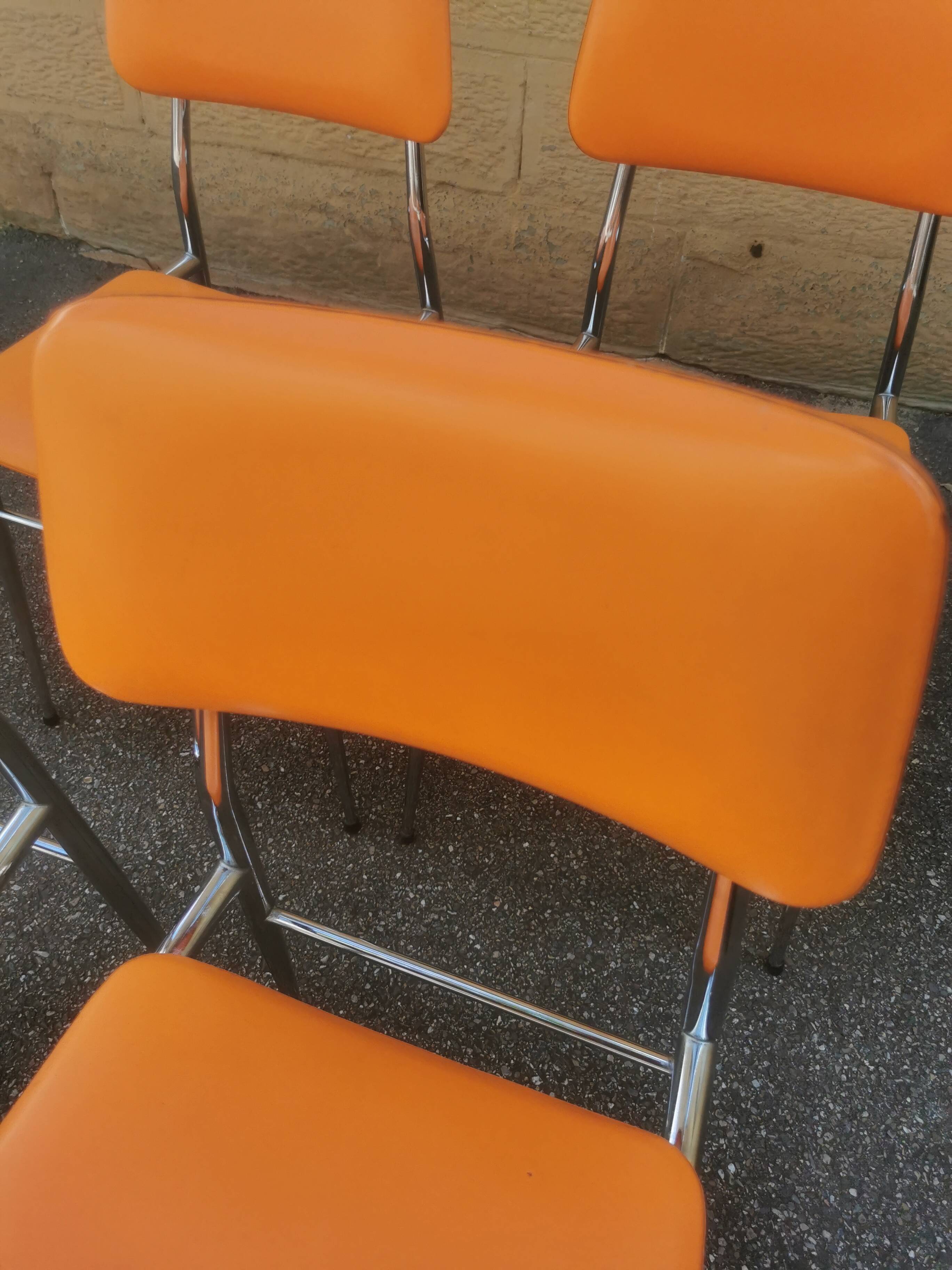 Tubmenager orange vintage chairs