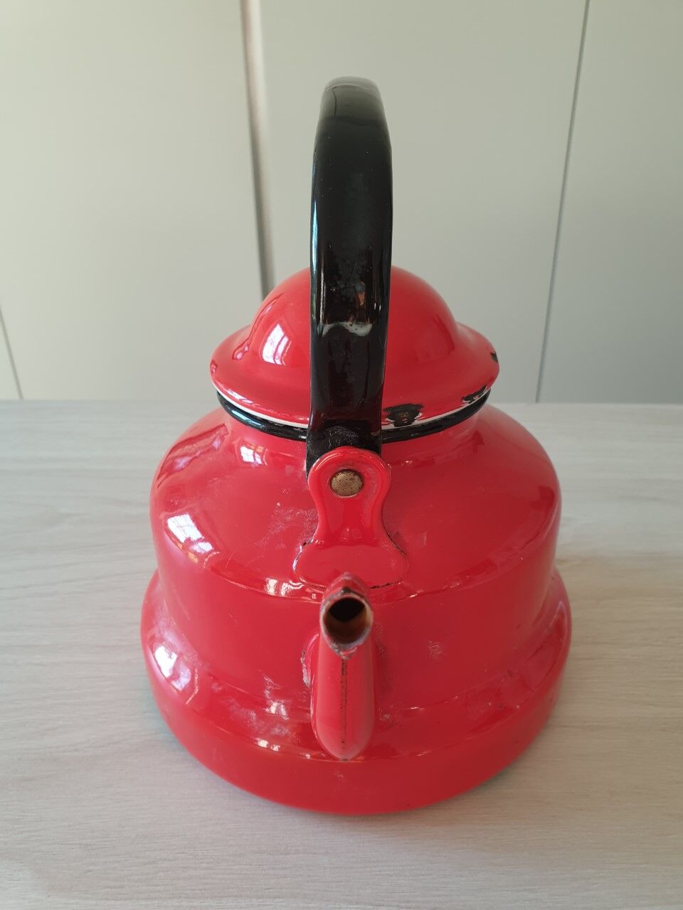 Vintage enamelled sheet metal kettle