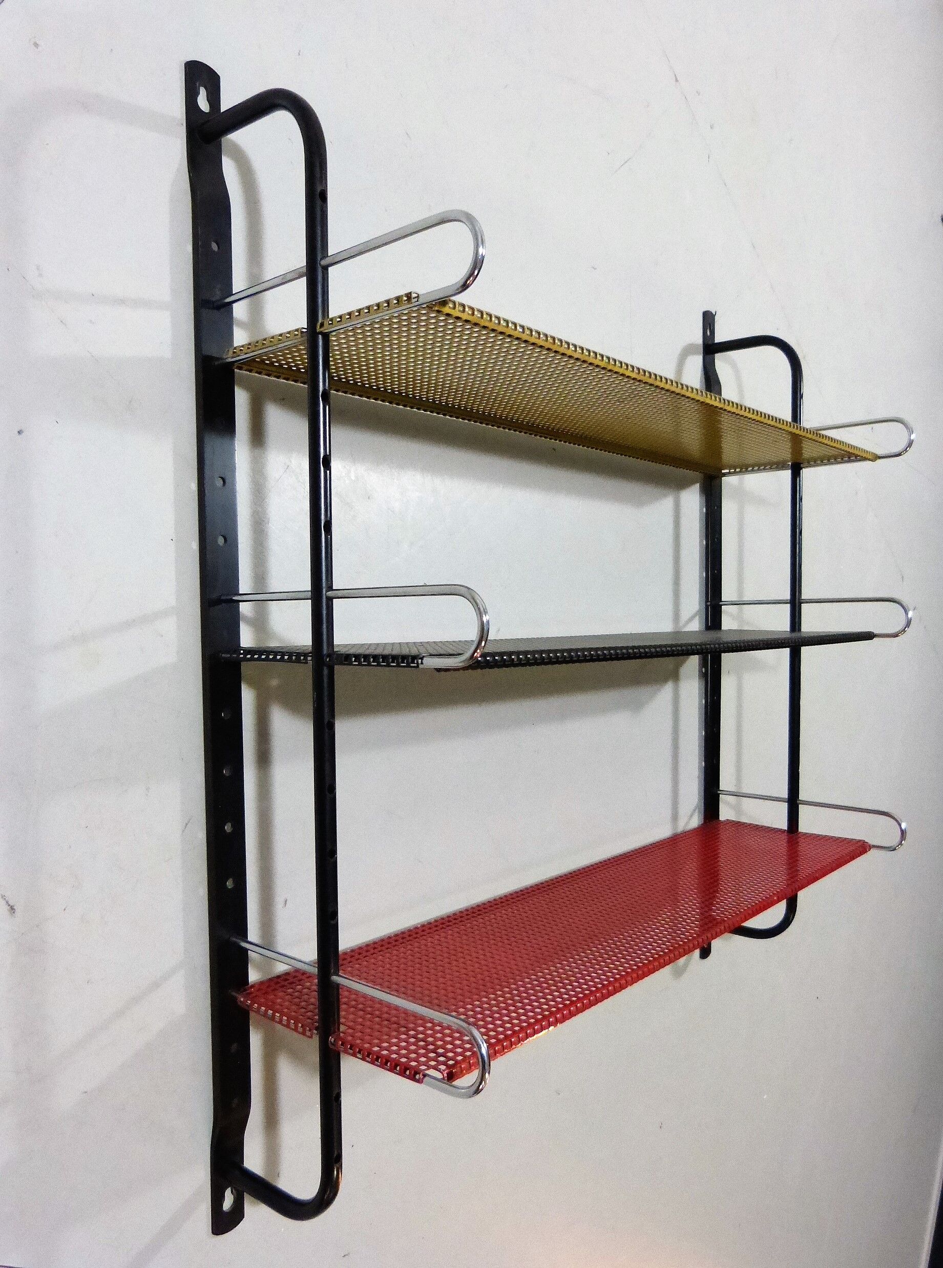 Steel wall system, book rack 1960’s