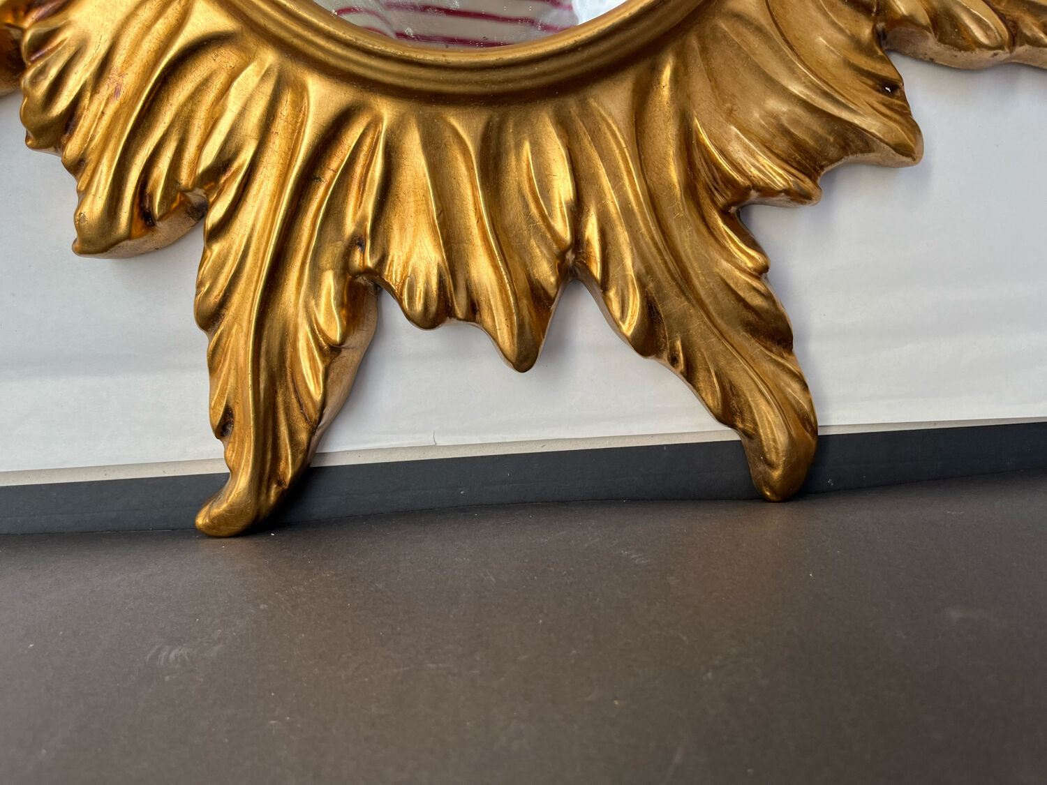 Miroir soleil en bois doré