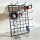 Vintage black metal wall loom display