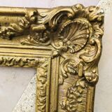 Old frame in gilded molded wood