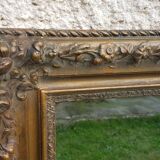 Wood mirror and gilded stucco, 19th, 124x73 cm