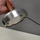 Table lamp with a teak ‘trunk’, silver-coloured metal base, acrylic shade