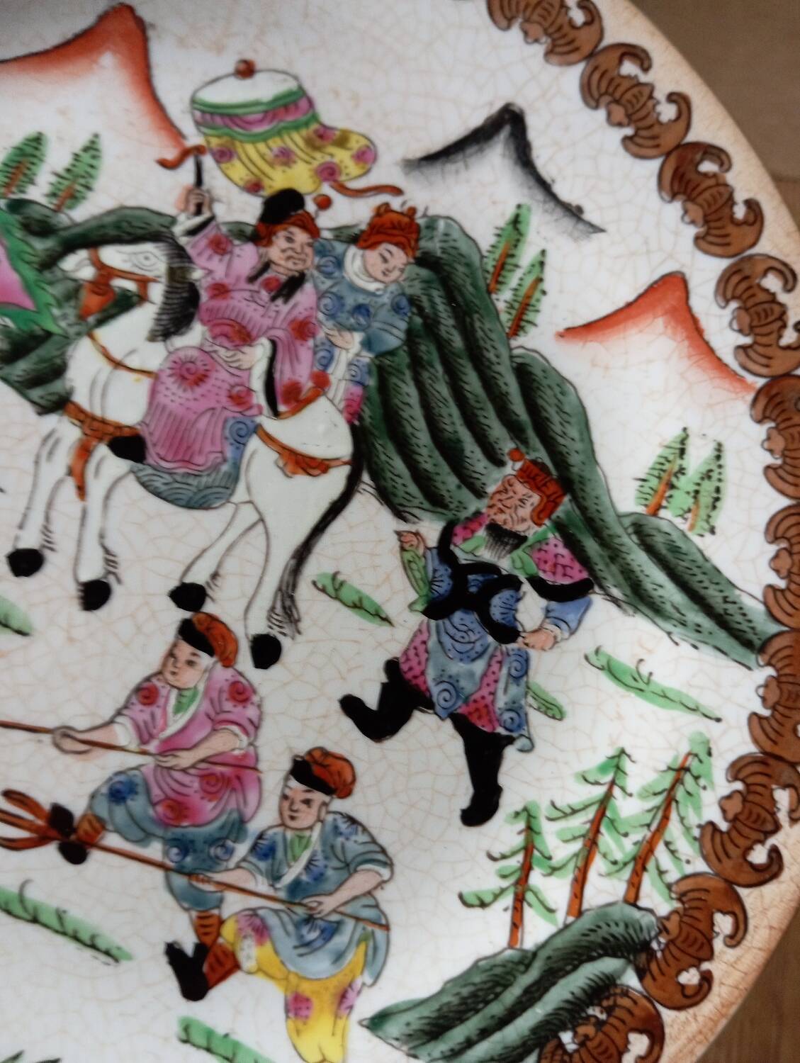 Antique Asian polychrome porcelain plate, hunting scene