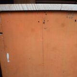 Small piece of furniture with orange patina