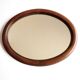 Oval mirror with wooden frame