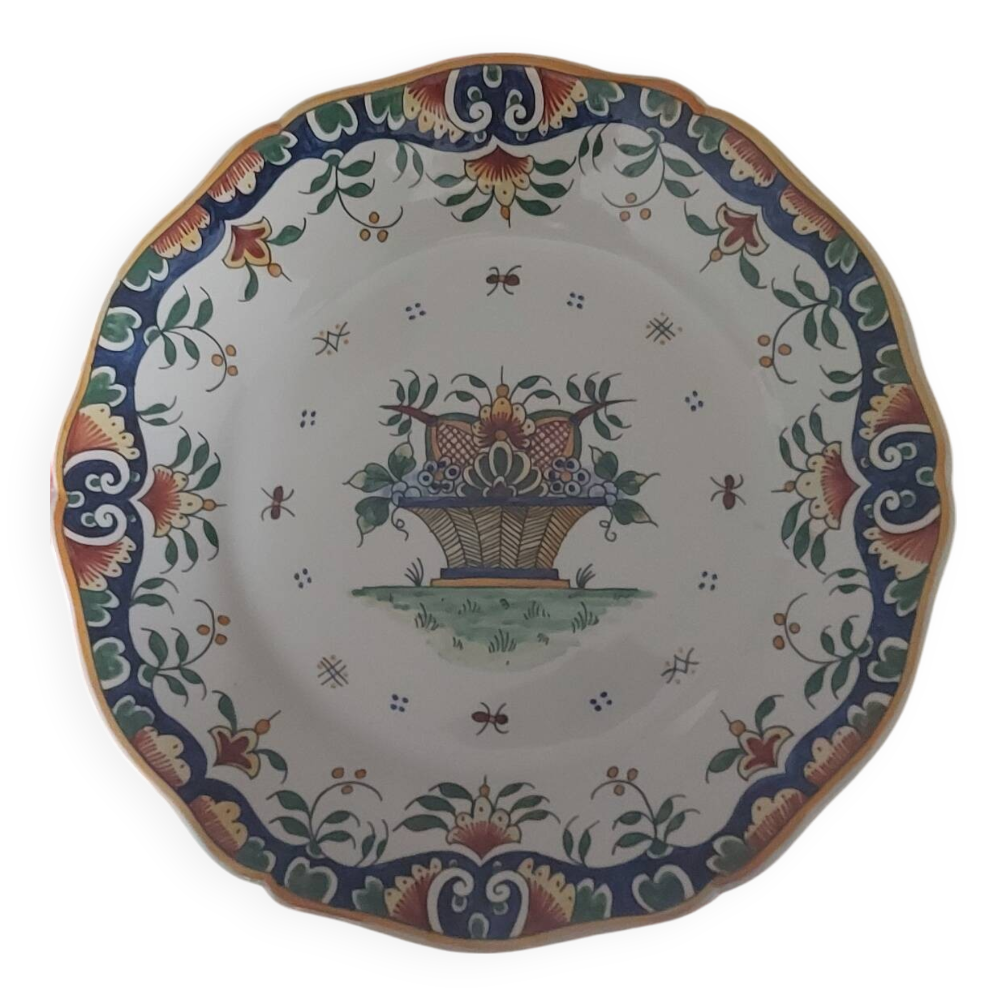 Faience plate from Desvres, Rouen decoration, signed René Delarue.