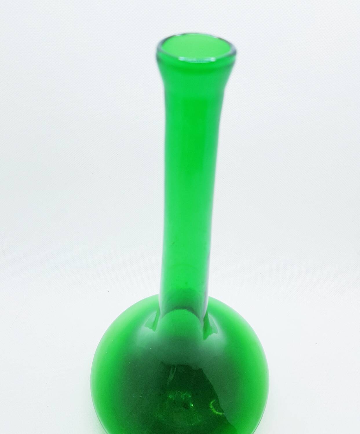Tall green glass bud vase