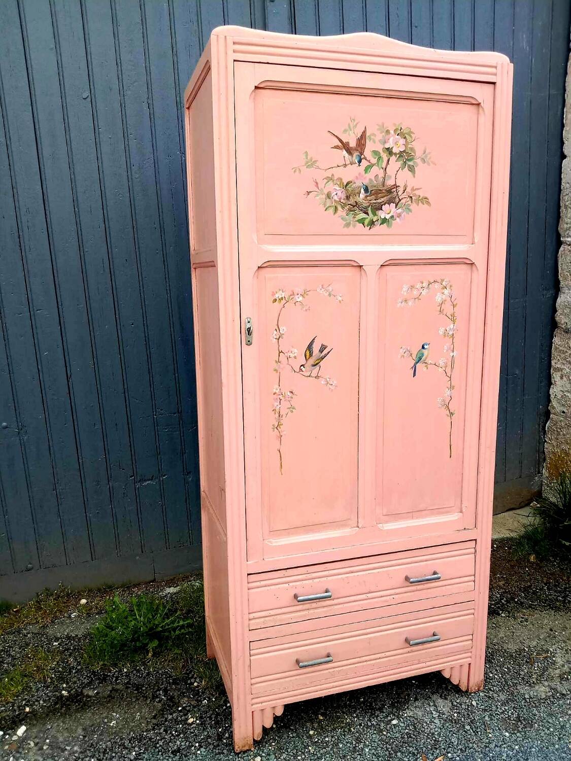 Old pink Parisian cabinet with painted decor