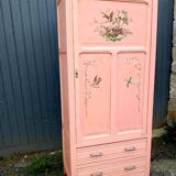 Old pink Parisian cabinet with painted decor
