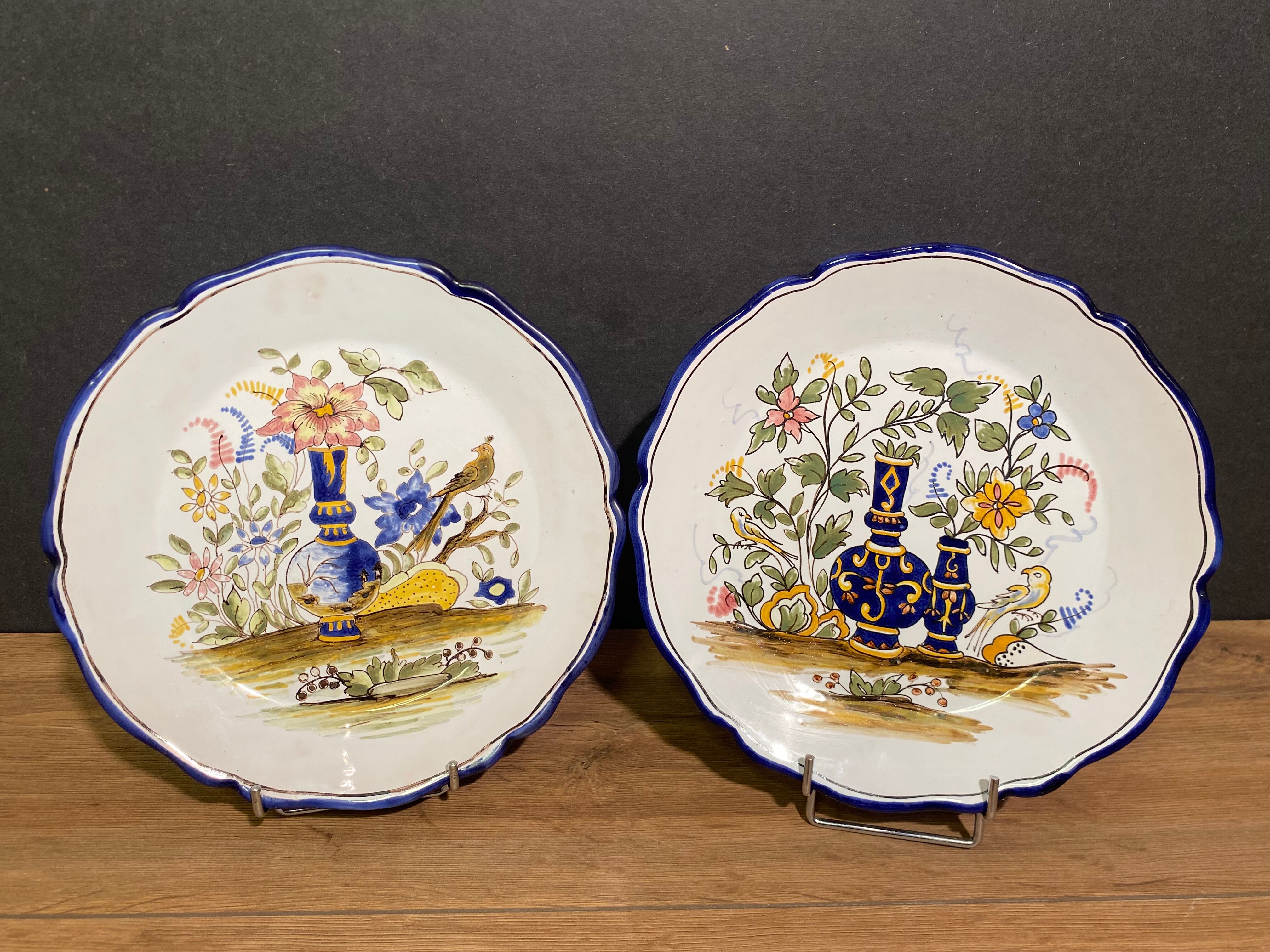 Pair of Nevers earthenware plates signed Georges