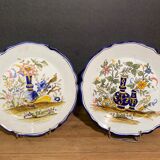 Pair of Nevers earthenware plates signed Georges