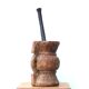 African mortar in carved wood, cast iron pestle, 70s