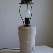 Modern vintage French table lamp, made of stone with fish patterns, 1970s.