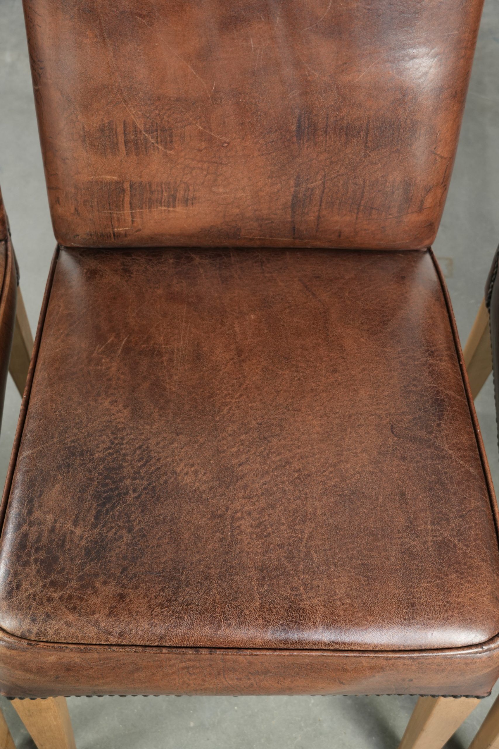 Vintage set of 4 dining chairs made of sheepskin leather with a high back