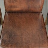 Vintage set of 4 dining chairs made of sheepskin leather with a high back