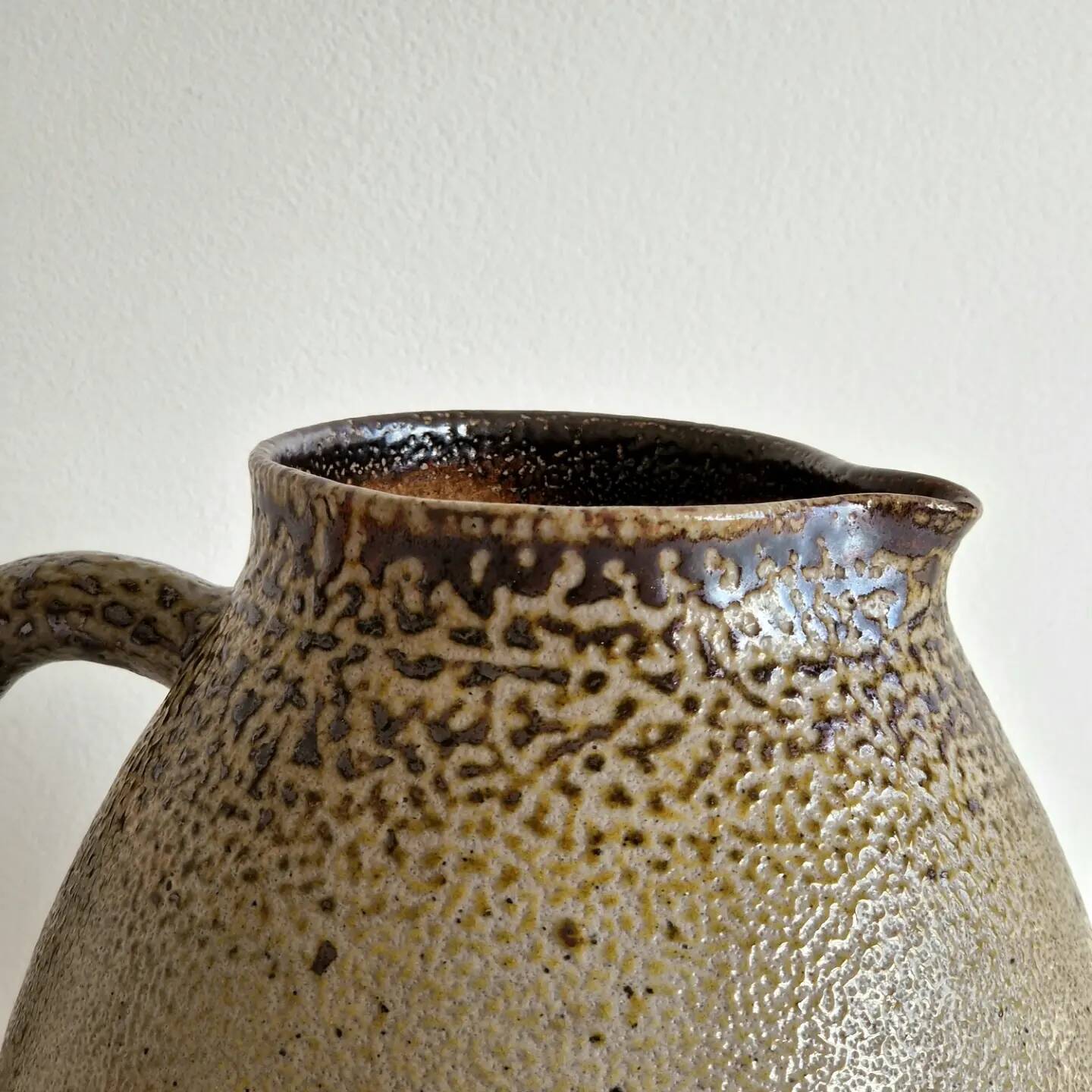 Impressive glazed stoneware pitcher