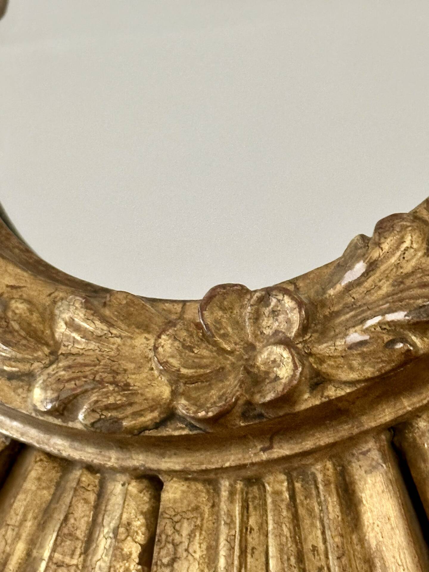Large sun mirror in carved gilded wood.
