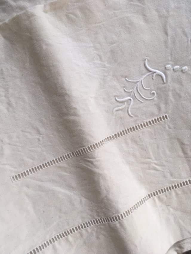 Mixed-race sheet with JPG monogram.