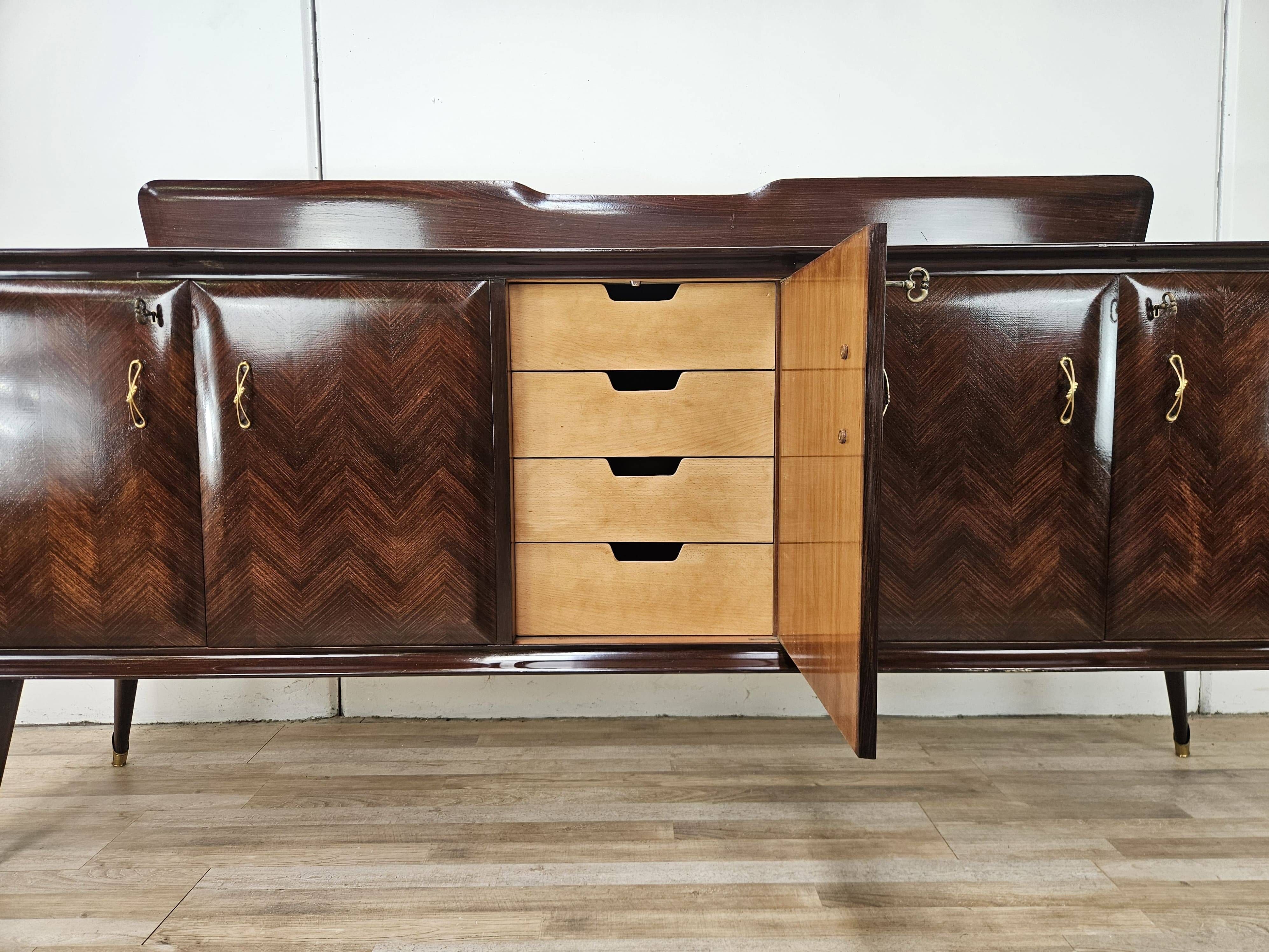 Mahogany sideboard with a glass top, 1960