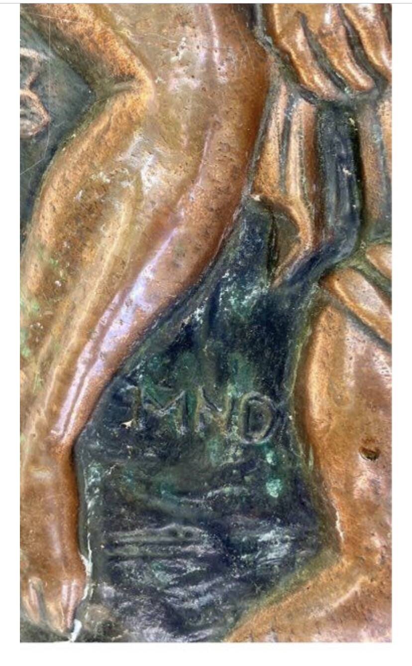 Antique red copper umbrella stand decorated with putti angels.