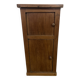 Old small storage unit with sliding and hinged doors.